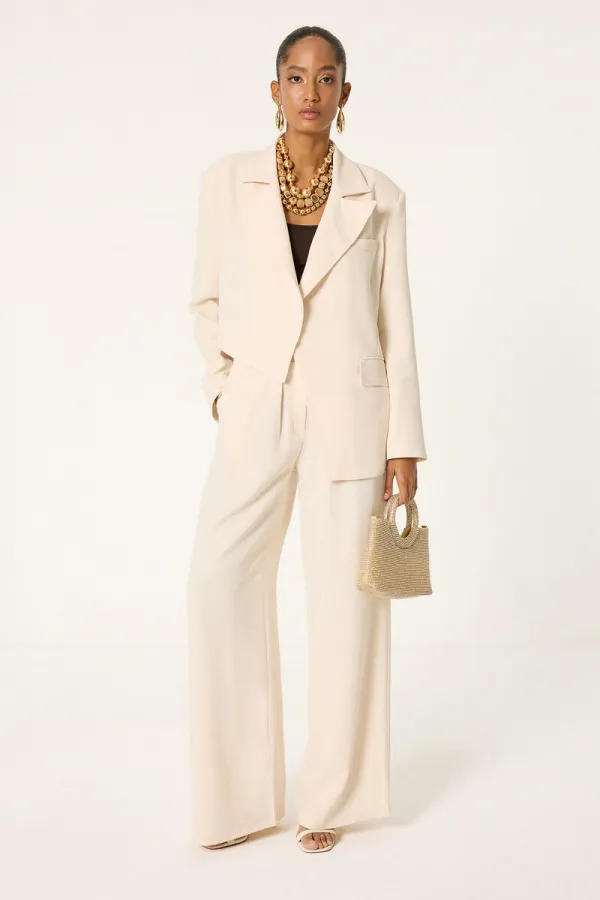 ENSEMBLE VESTE ET PANTALON ASYMÉTRIQUE