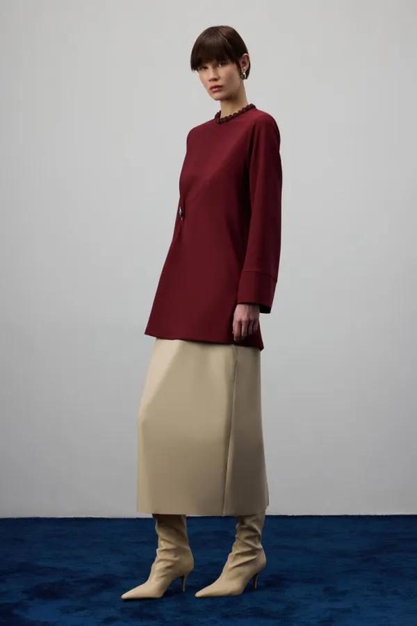 DRAPED BLOUSE WITH METAL ACCESSORIES