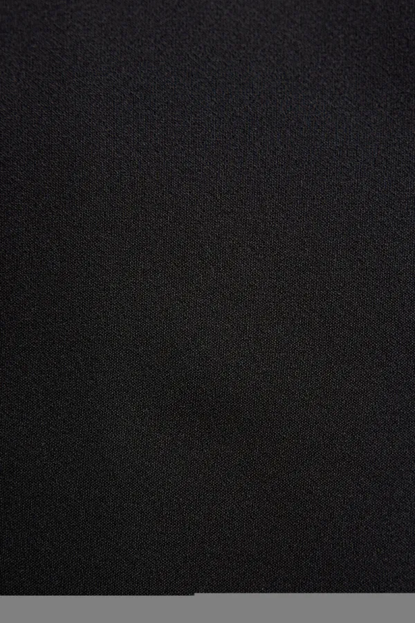 GILET EN CRÊPE À GARNITURE EN MOUSSELINE