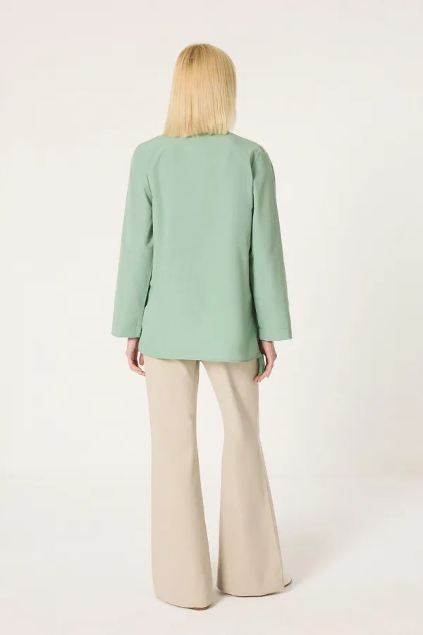 CHEMISE ASYMÉTRIQUE AVEC DÉTAILS PLISSÉS