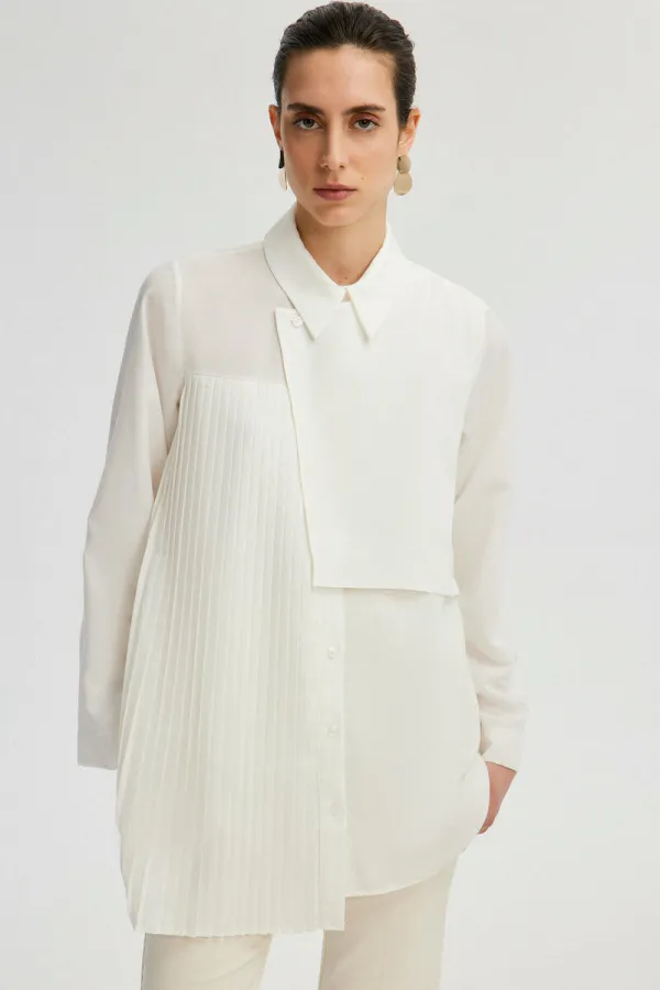 ASYMMETRICAL SHIRT WITH PLEATED DETAILS