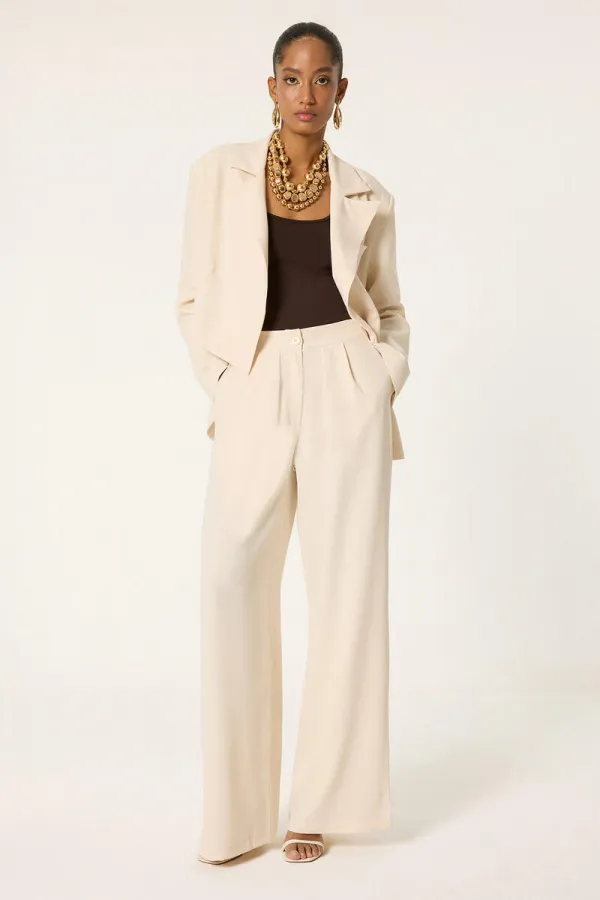 ENSEMBLE VESTE ET PANTALON ASYMÉTRIQUE