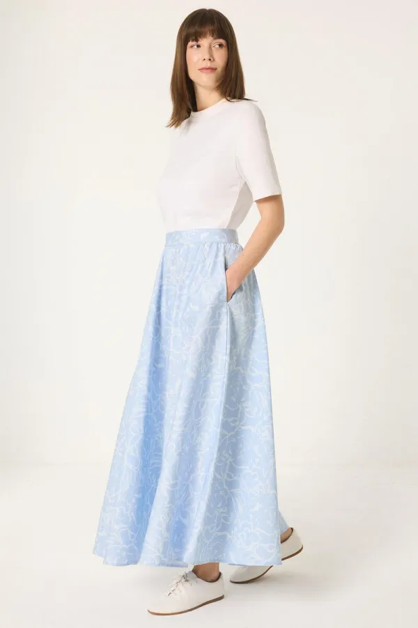 JUPE ÉVASÉE À MOTIFS