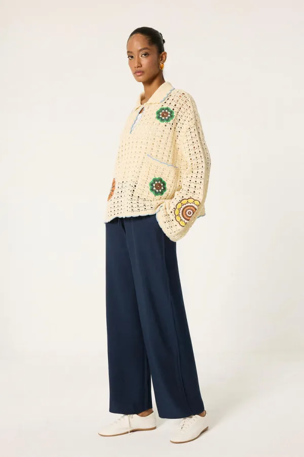 PANTALON LOGAL À JAMBES LARGES