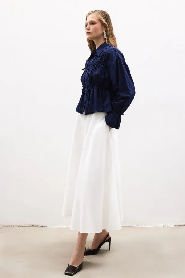 CHEMISE À NŒUD HABILLÉE