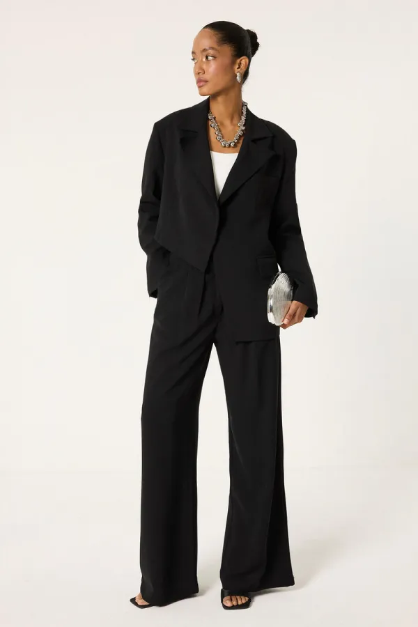 ENSEMBLE VESTE ET PANTALON ASYMÉTRIQUE