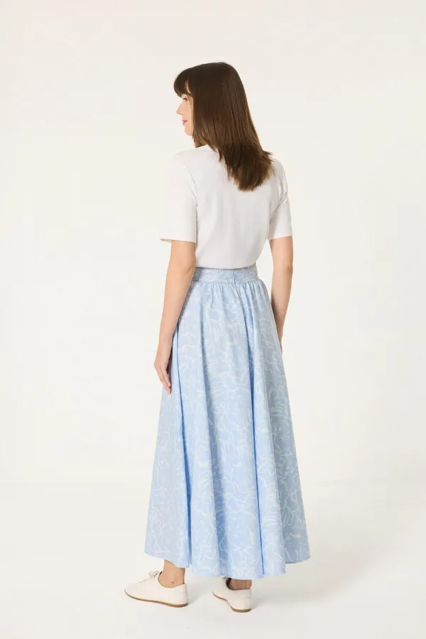 JUPE ÉVASÉE À MOTIFS