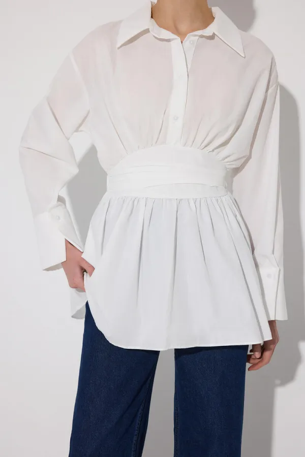 PEPLUM TUNIC WITH CORSET AT THE WAIST