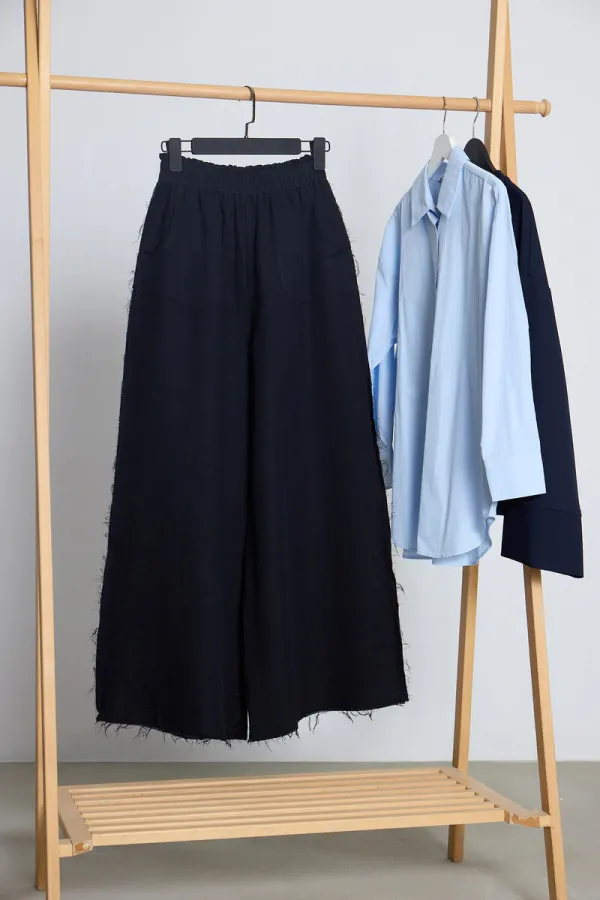 WIDE-LEG MUSLIN PANTS WITH POCKETS