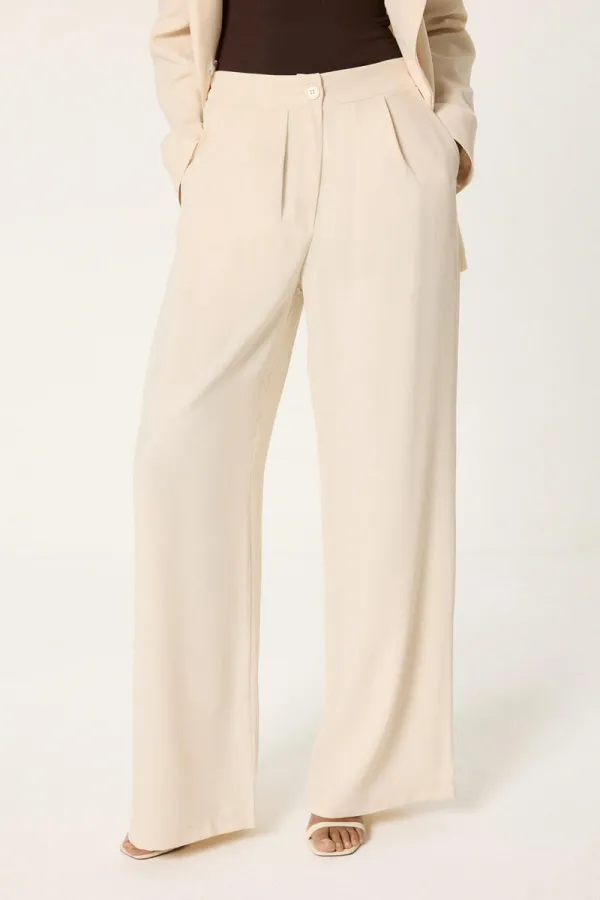 ENSEMBLE VESTE ET PANTALON ASYMÉTRIQUE