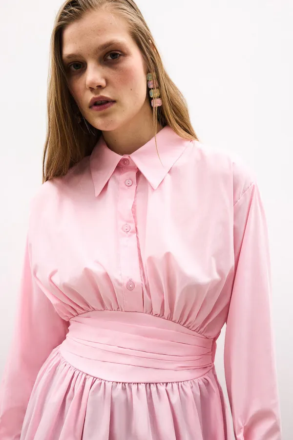 PEPLUM TUNIC WITH CORSET AT THE WAIST