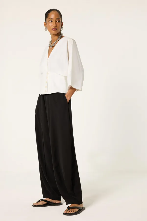 PANTALON EN CRÊPE PLISSÉ