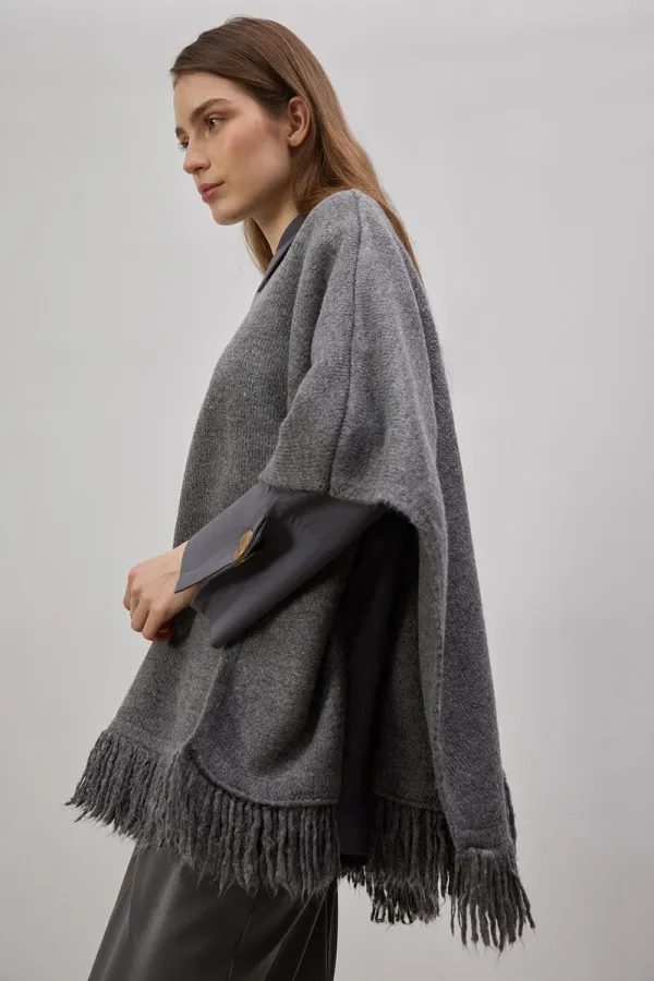 PONCHO EN MAILLE À FRANGES