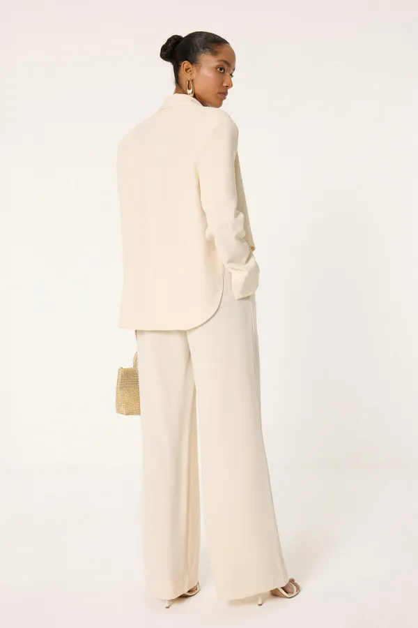 ENSEMBLE VESTE ET PANTALON ASYMÉTRIQUE