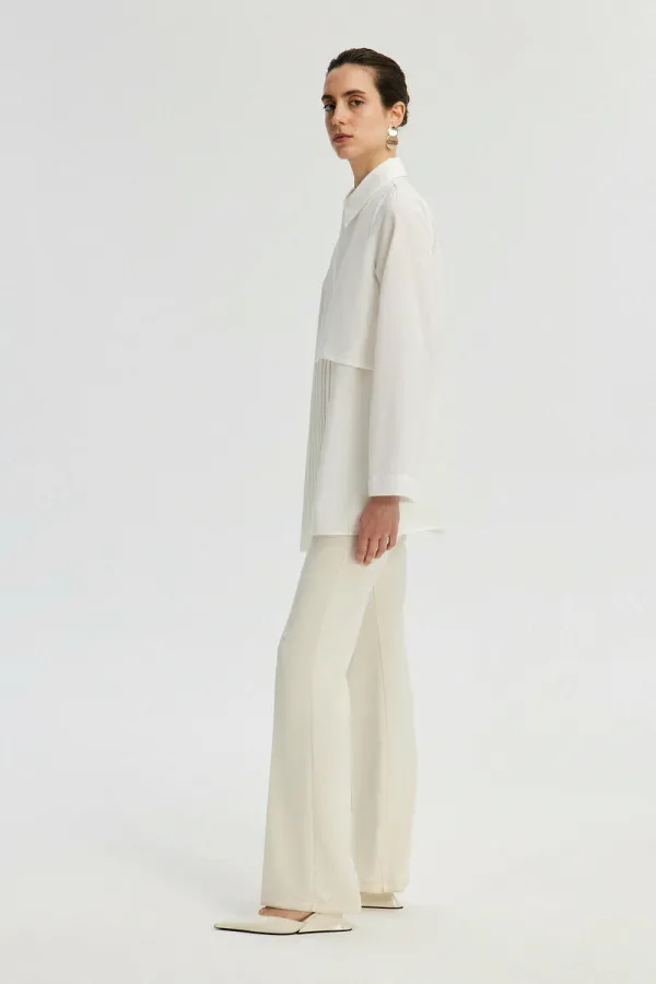 ASYMMETRICAL SHIRT WITH PLEATED DETAILS