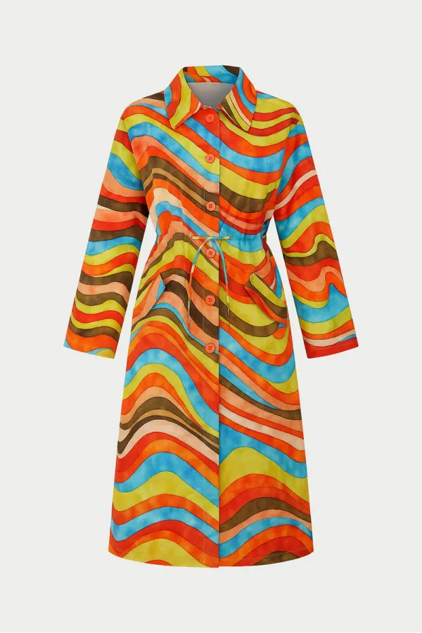 ABSTRACT PATTERNED TRENCH COAT WITH GATHERED WAIST.