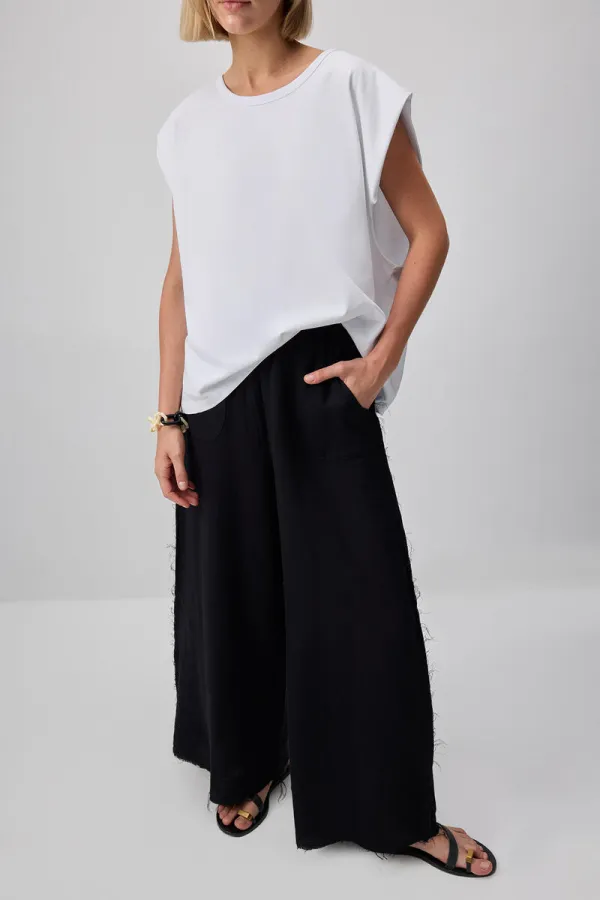WIDE-LEG MUSLIN PANTS WITH POCKETS