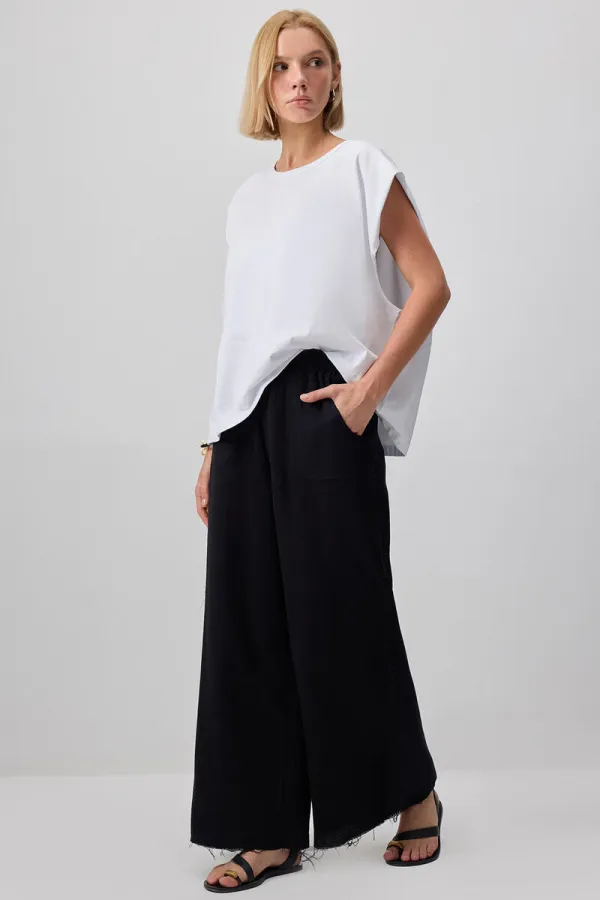 WIDE-LEG MUSLIN PANTS WITH POCKETS