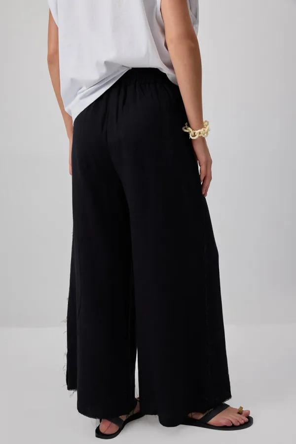 WIDE-LEG MUSLIN PANTS WITH POCKETS