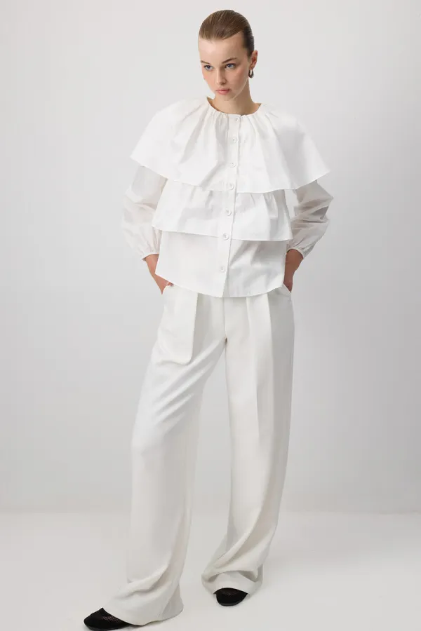 CHEMISE COURTE À VOLANTS