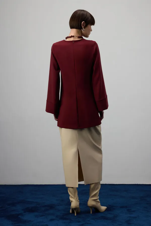 DRAPED BLOUSE WITH METAL ACCESSORIES