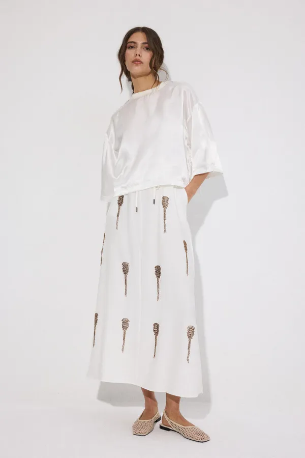 JUPE À PERLES AVEC TAILLE ÉLASTIQUE