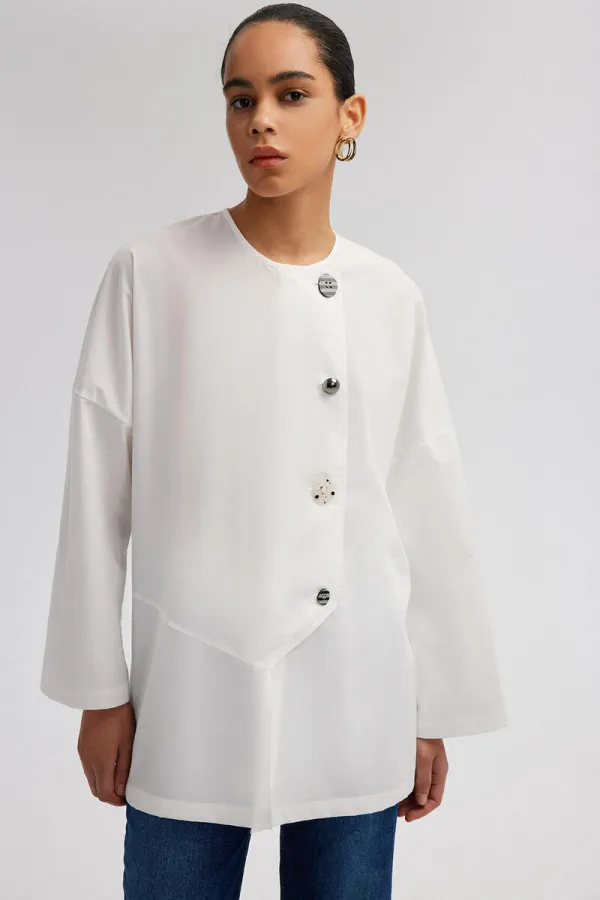 ASYMMETRICAL CUT SHIRT WITH BUTTON DETAIL ASYMMETRICAL CUT SHIRT WITH BUTTON DETAIL