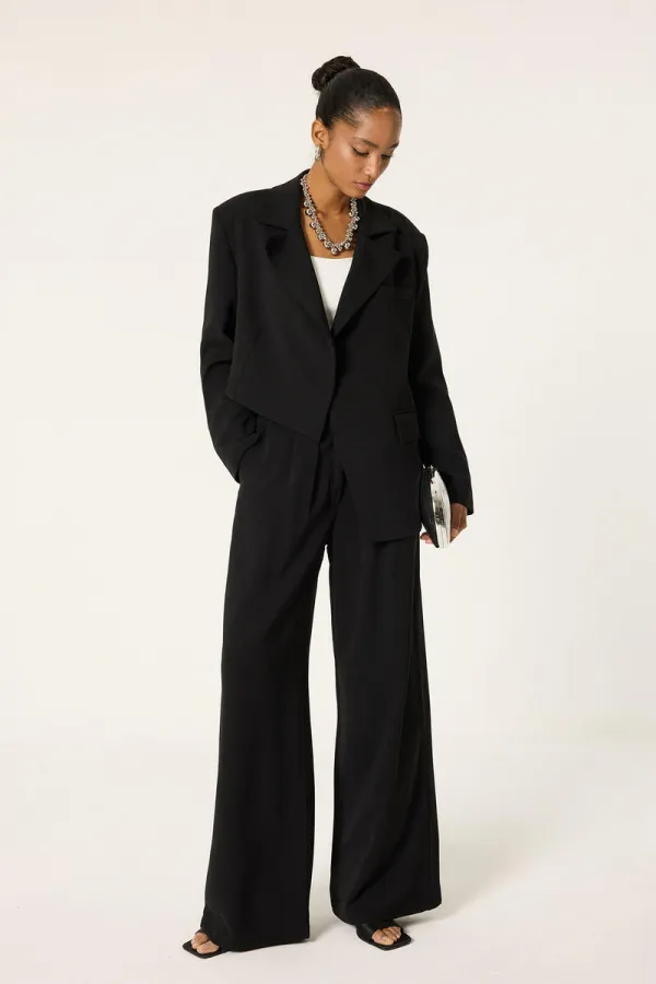 ENSEMBLE VESTE ET PANTALON ASYMÉTRIQUE