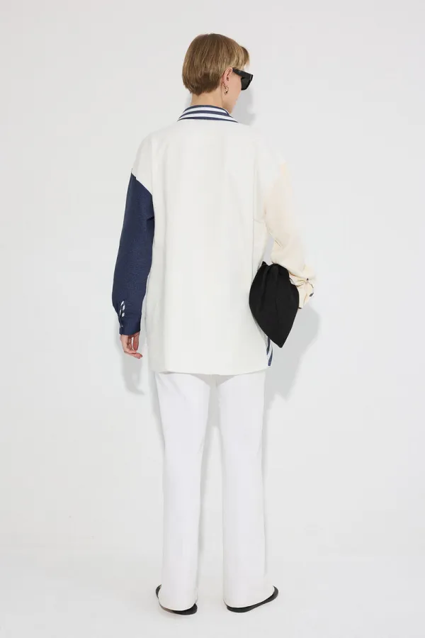 CHEMISE À COULEURS UNIES AVEC POCHES