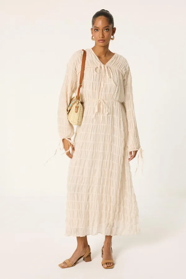 ROBE SPÉCIALE REMBOURRÉE ET FRONCÉE