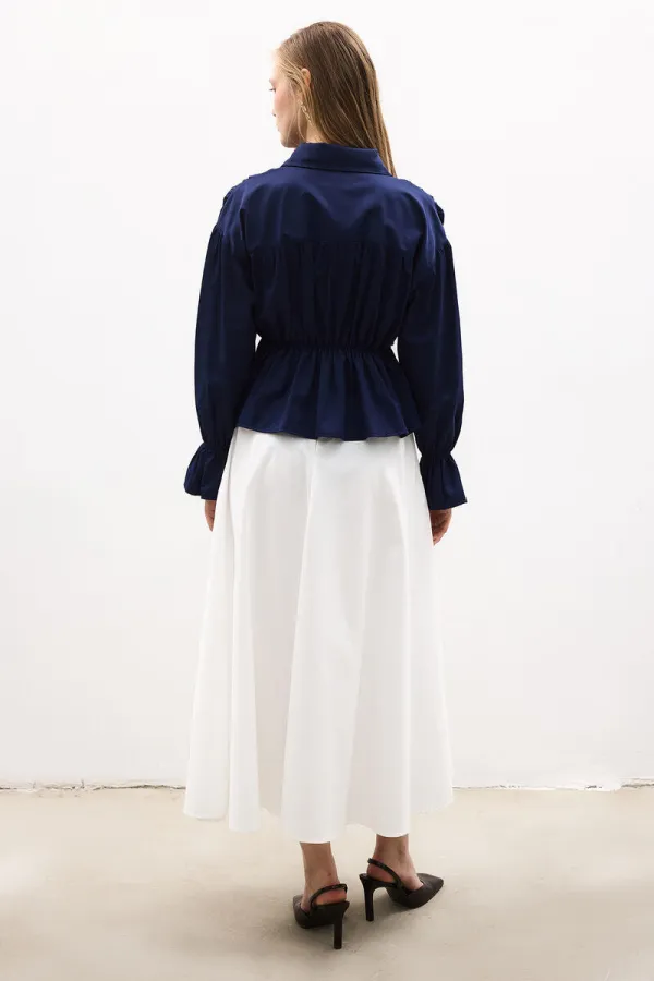 CHEMISE À NŒUD HABILLÉE