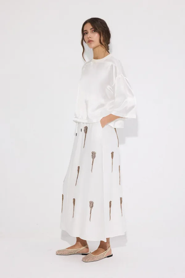 JUPE À PERLES AVEC TAILLE ÉLASTIQUE