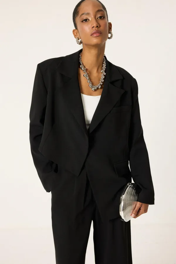 ENSEMBLE VESTE ET PANTALON ASYMÉTRIQUE