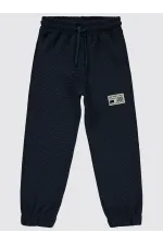 Bas de survêtement garçon 6-9 ans, bleu pétrole foncé - Lot