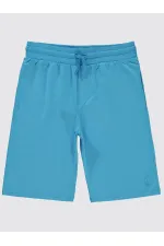 Capri garçon 6-9 ans Turquoise - Emballage