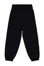 Bas de survêtement garçon 6-9 ans Noir - Lot