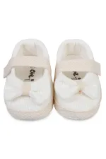 Chaussons bébé pointure 18-21, blanc cassé - Emballage