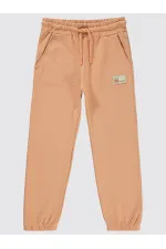 Bas de survêtement fille 10-13 ans, couleur terre cuite italienne - Emballage