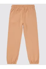 Bas de survêtement fille 10-13 ans, couleur terre cuite italienne - Emballage