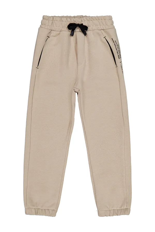 Bas de survêtement garçon 6-9 ans beige - Lot