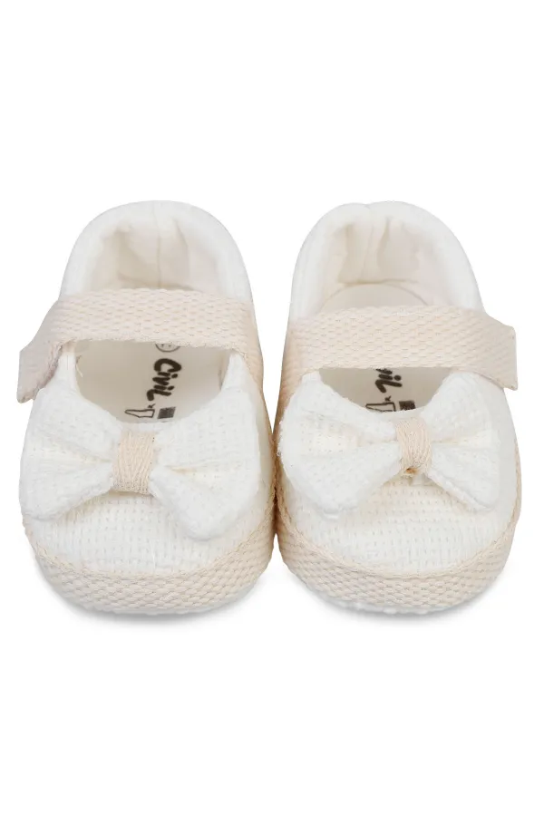 Chaussons bébé pointure 18-21, blanc cassé - Emballage