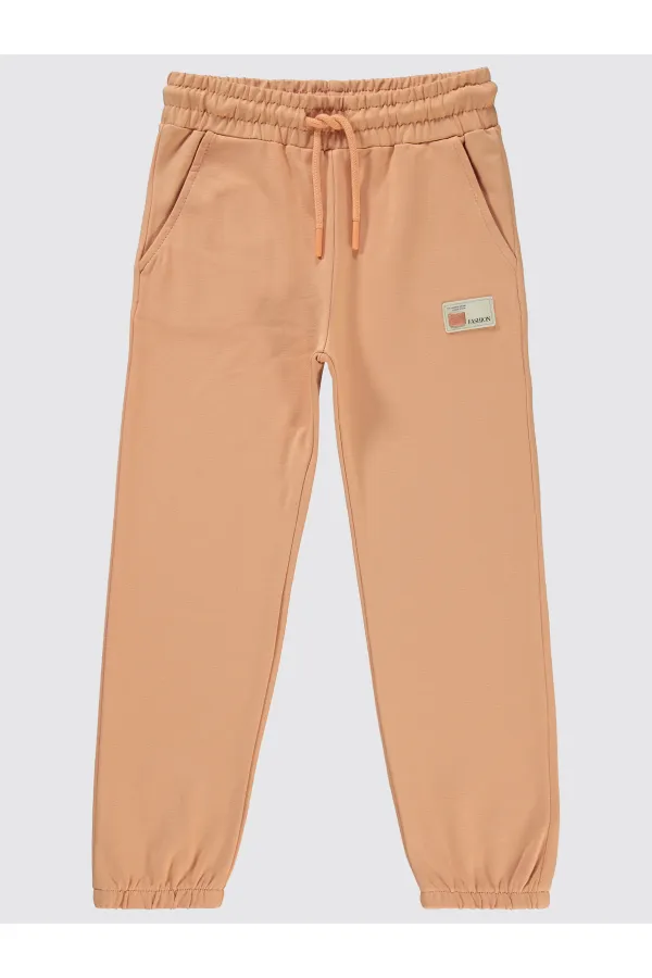 Bas de survêtement fille 10-13 ans, couleur terre cuite italienne - Emballage