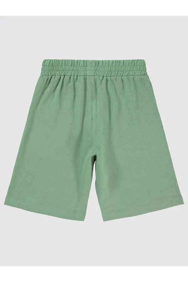 Shorty garçon vert 6-9 ans - Paquet