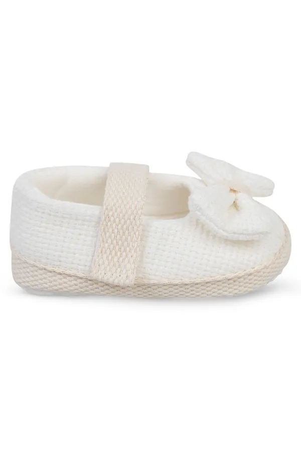 Chaussons bébé pointure 18-21, blanc cassé - Emballage