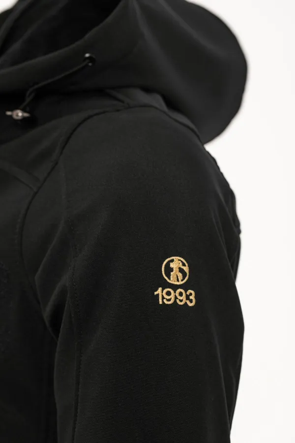 Fur-lined, waterproof and windproof black softshell winter coat for men.