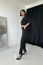 Combinaison fendue noire en gros