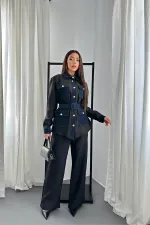 Ensemble chemise et pantalon à poches noires garnies en gros
