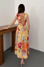 Robe d'été jaune à imprimé floral en gros