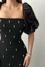 Robe à manches brodées noires en gros