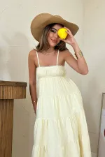 Robe en mousseline rayée jaune à bretelles en gros